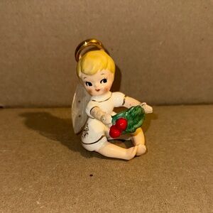 Charming Angel Ornament with Red and Gold Accents